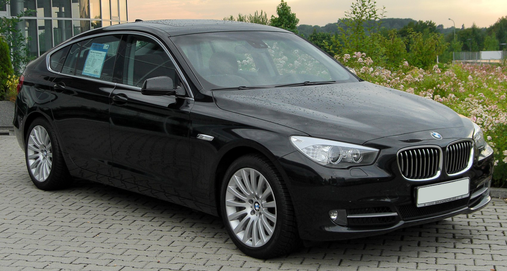 Luxury sedan with kidney grille and sleek headlight design
