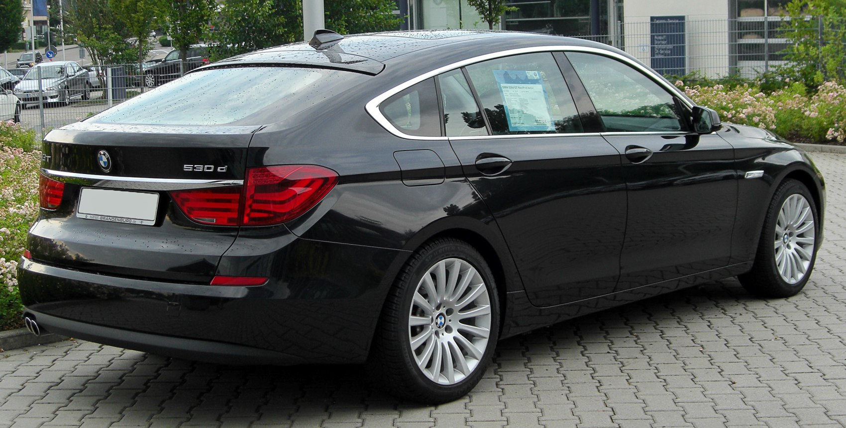 Rear and side view showing hatchback design and taillights