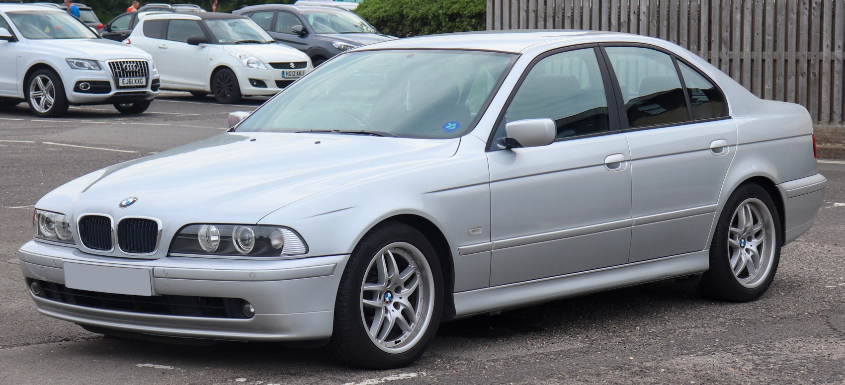 Silver sedan with kidney grille and dual headlights