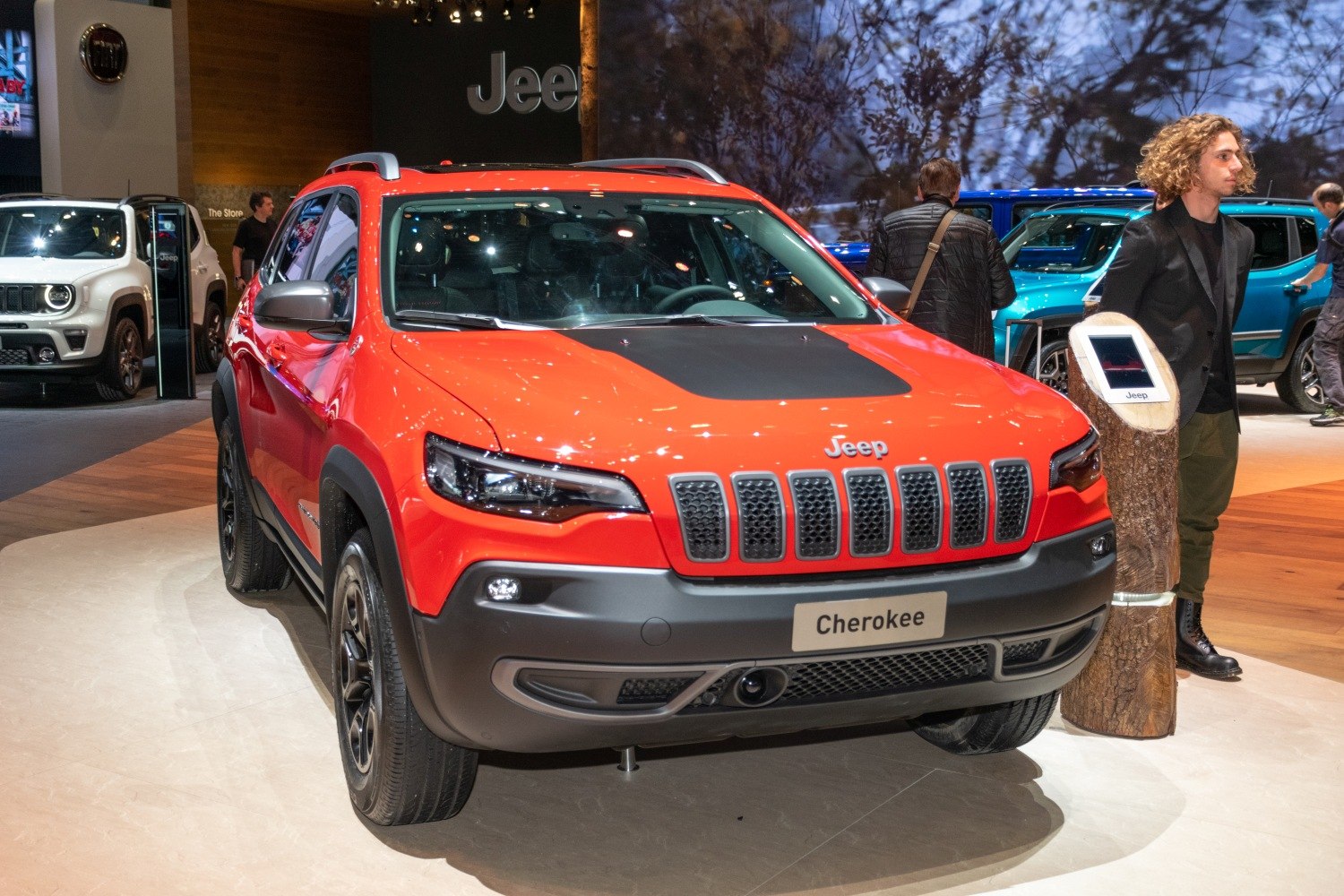 Front view with Jeep signature grille and sharp LED headlights