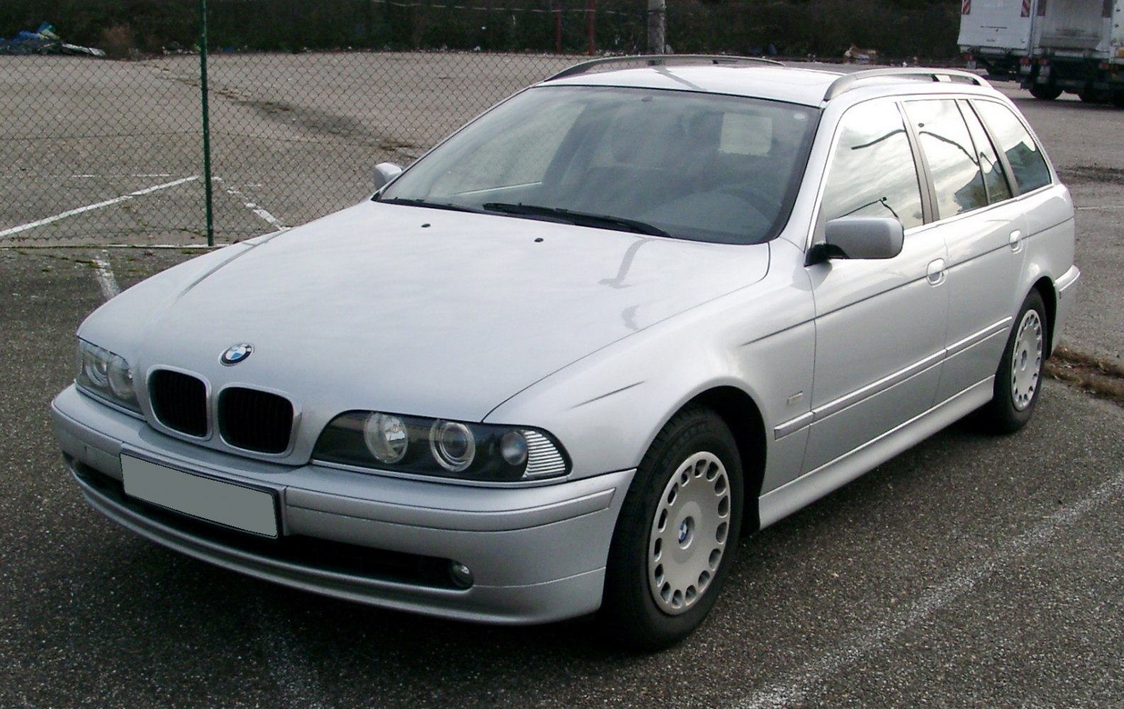Silver station wagon with kidney grille and alloy wheels