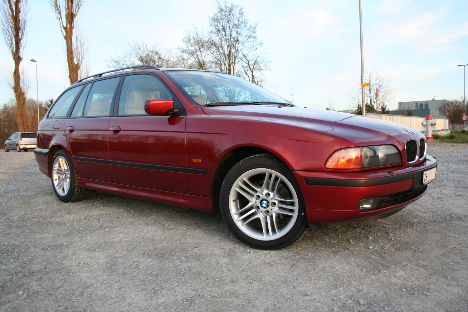 Side profile of a classic station wagon with alloy wheels