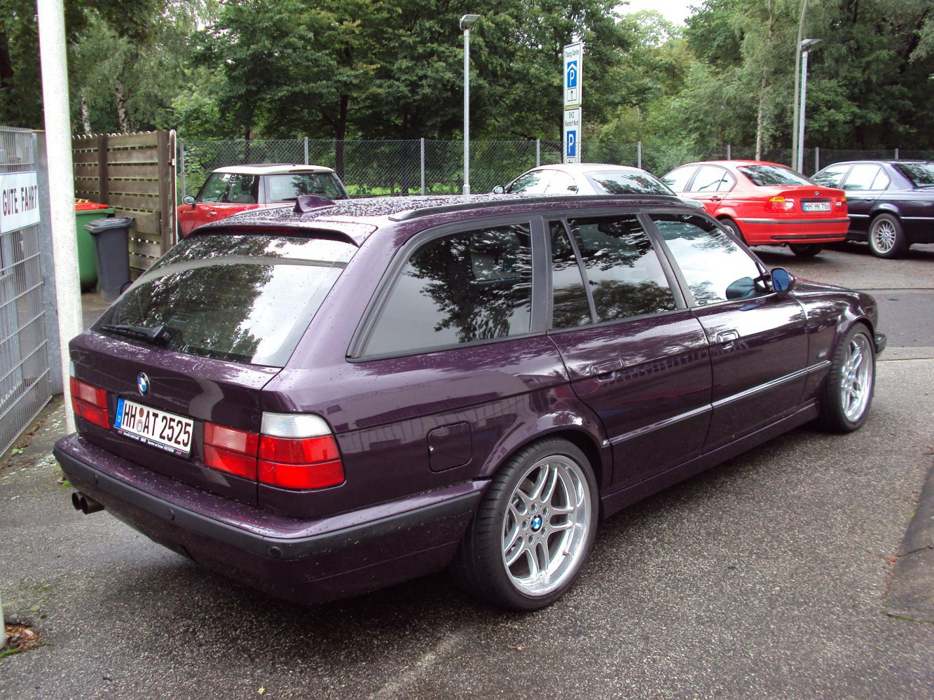 Classic station wagon with alloy wheels and rear roof spoiler