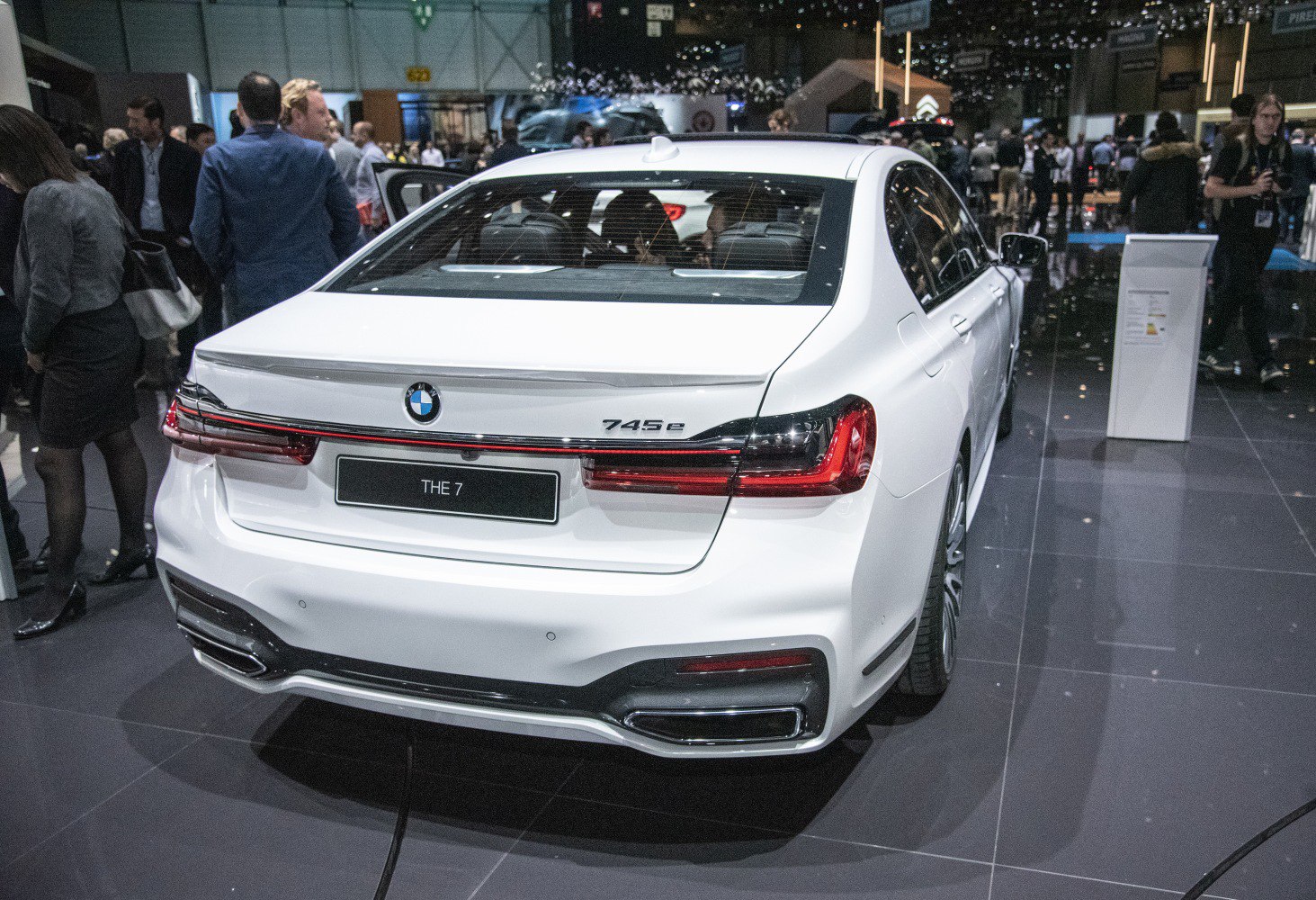Rear view with distinct tail lights and dual exhausts
