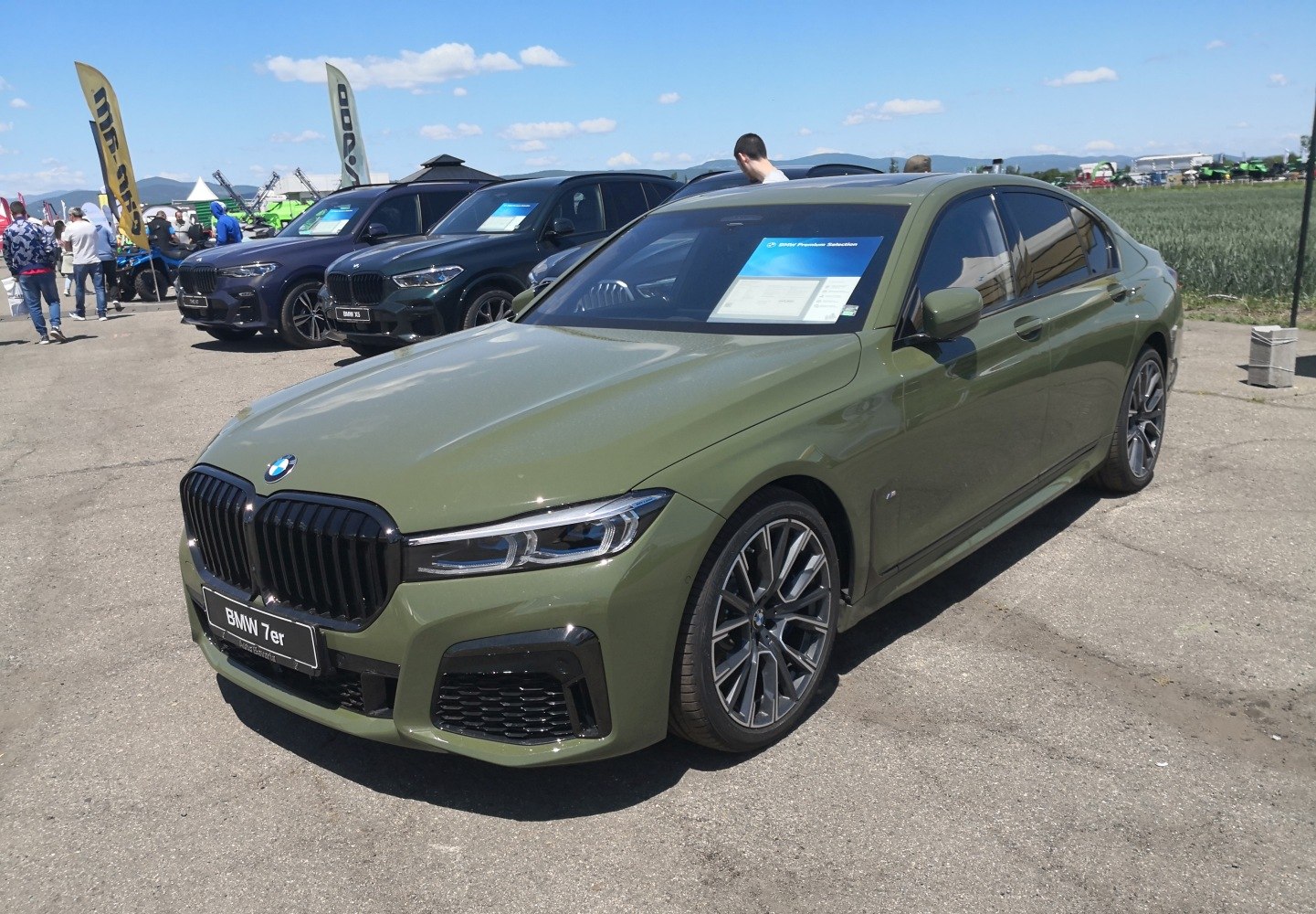 Front view of luxury sedan with kidney grille and LED headlights