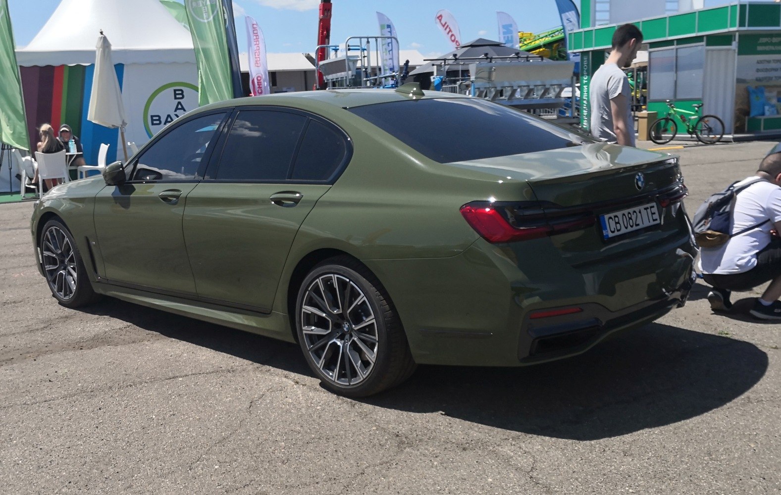 Rear side profile with tinted windows and multi-spoke alloys