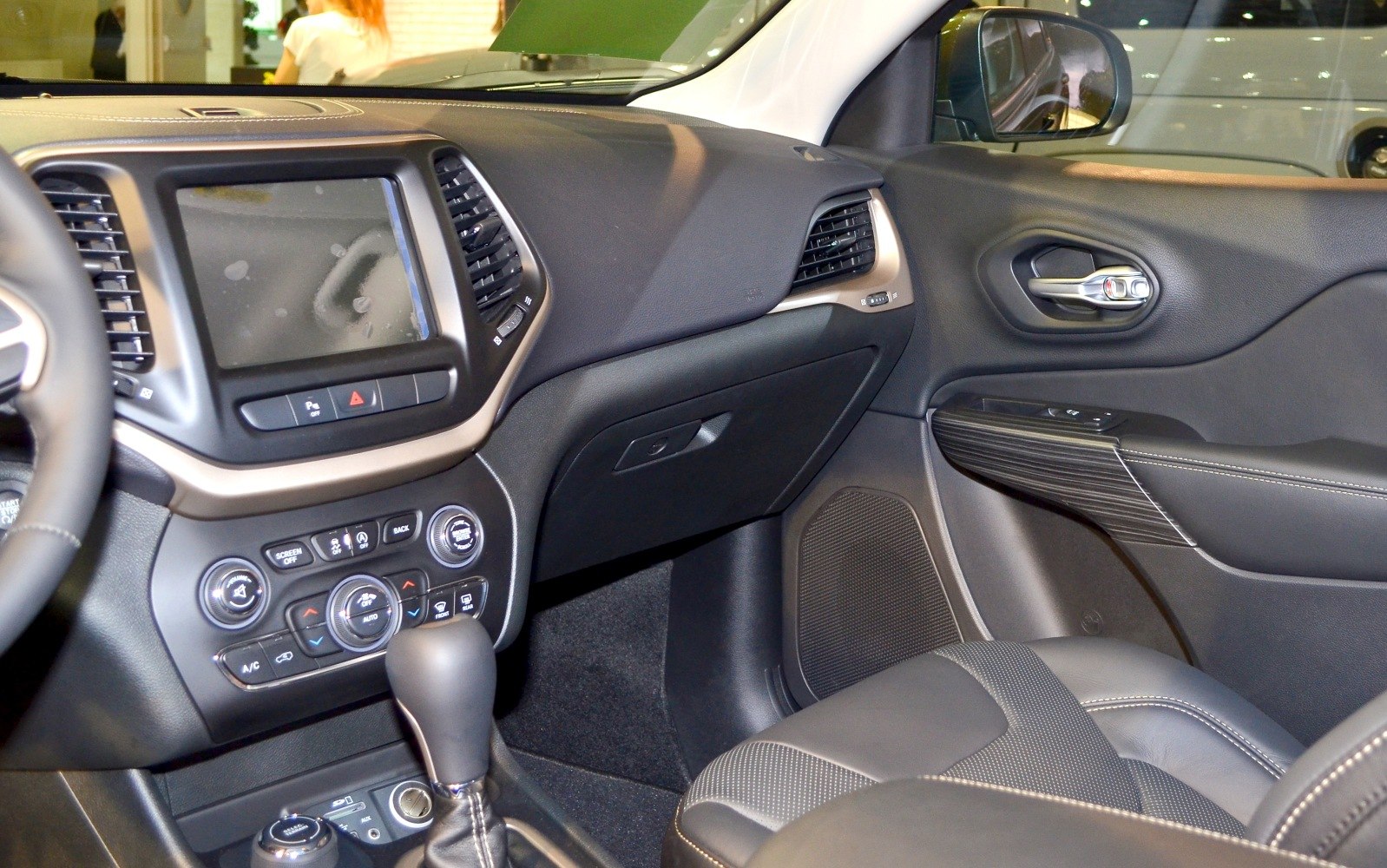 Dashboard and center console interior with gear shift and control buttons