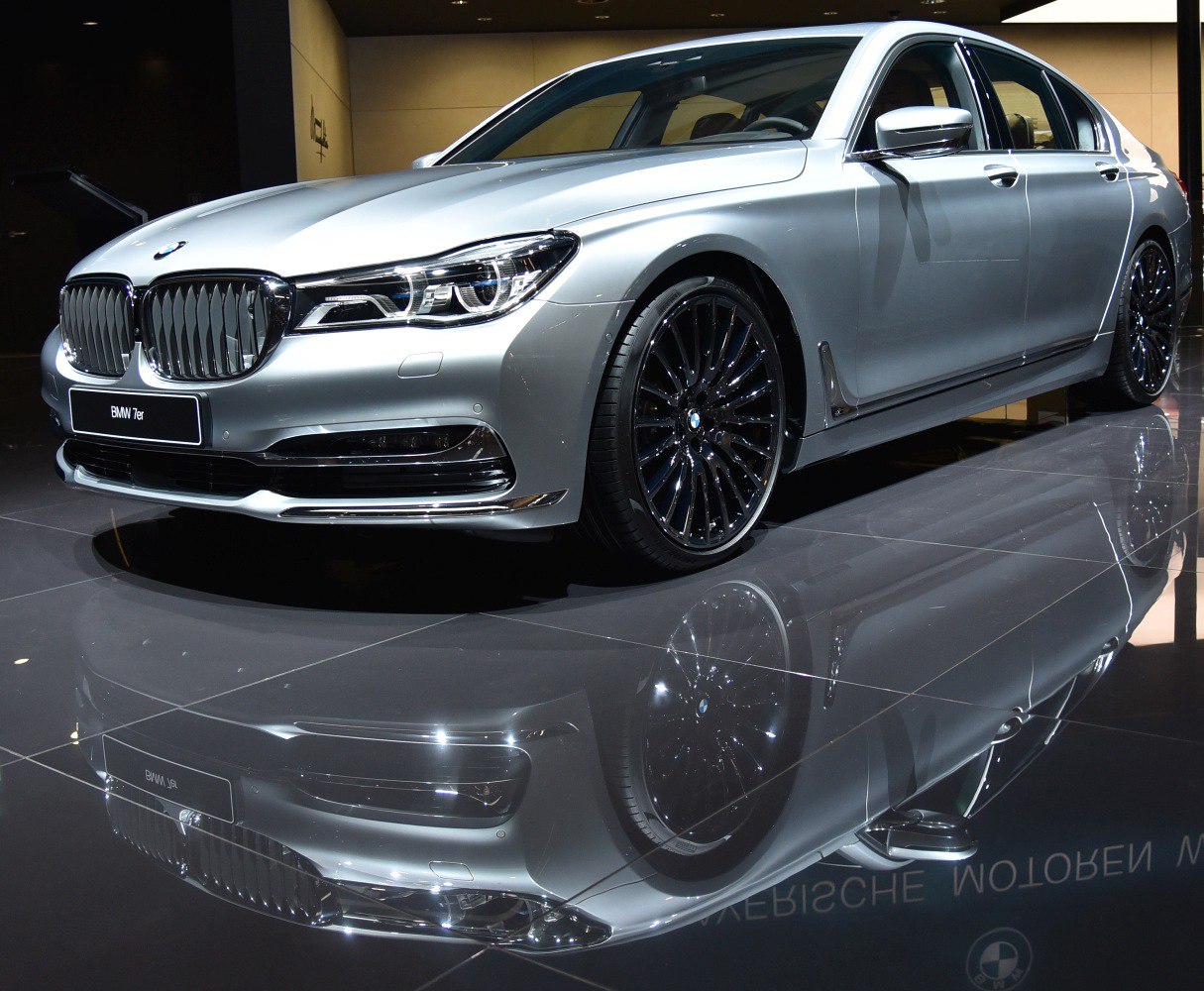 Silver luxury sedan with kidney grille and LED headlights