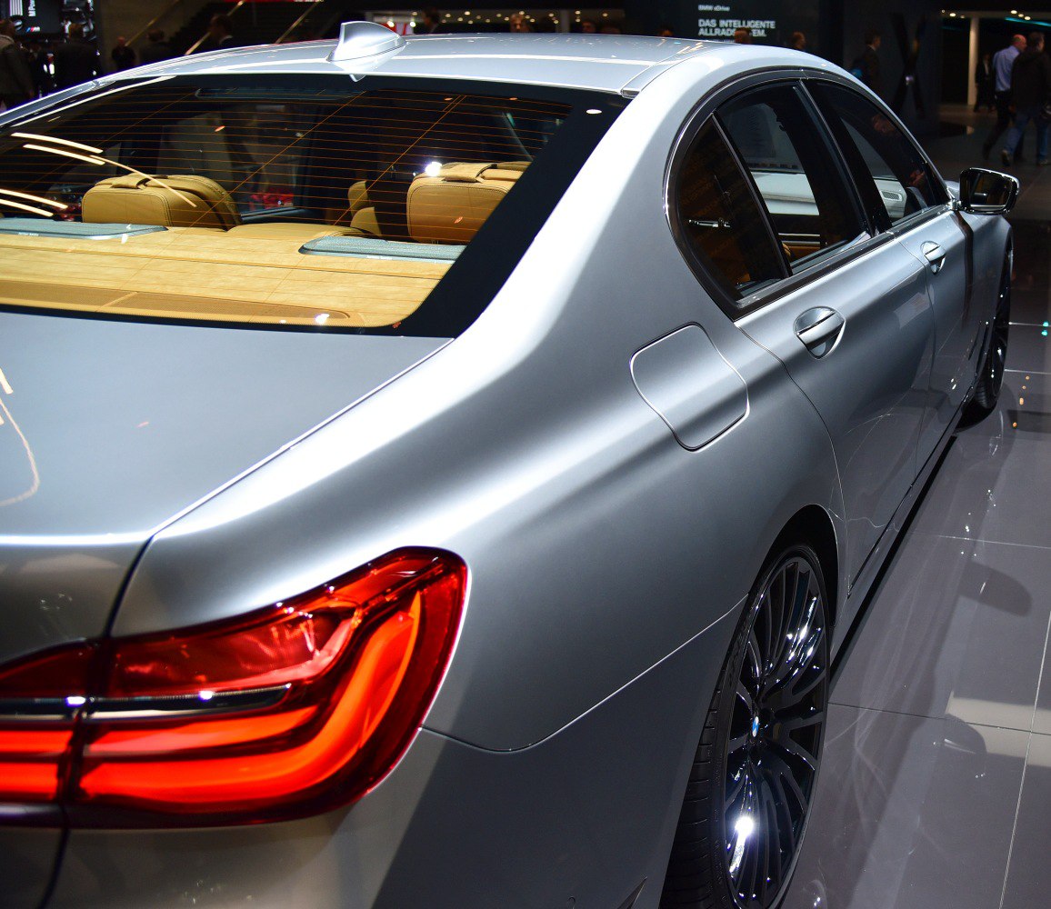 Rear side profile with LED tail lights and luxury sedan features