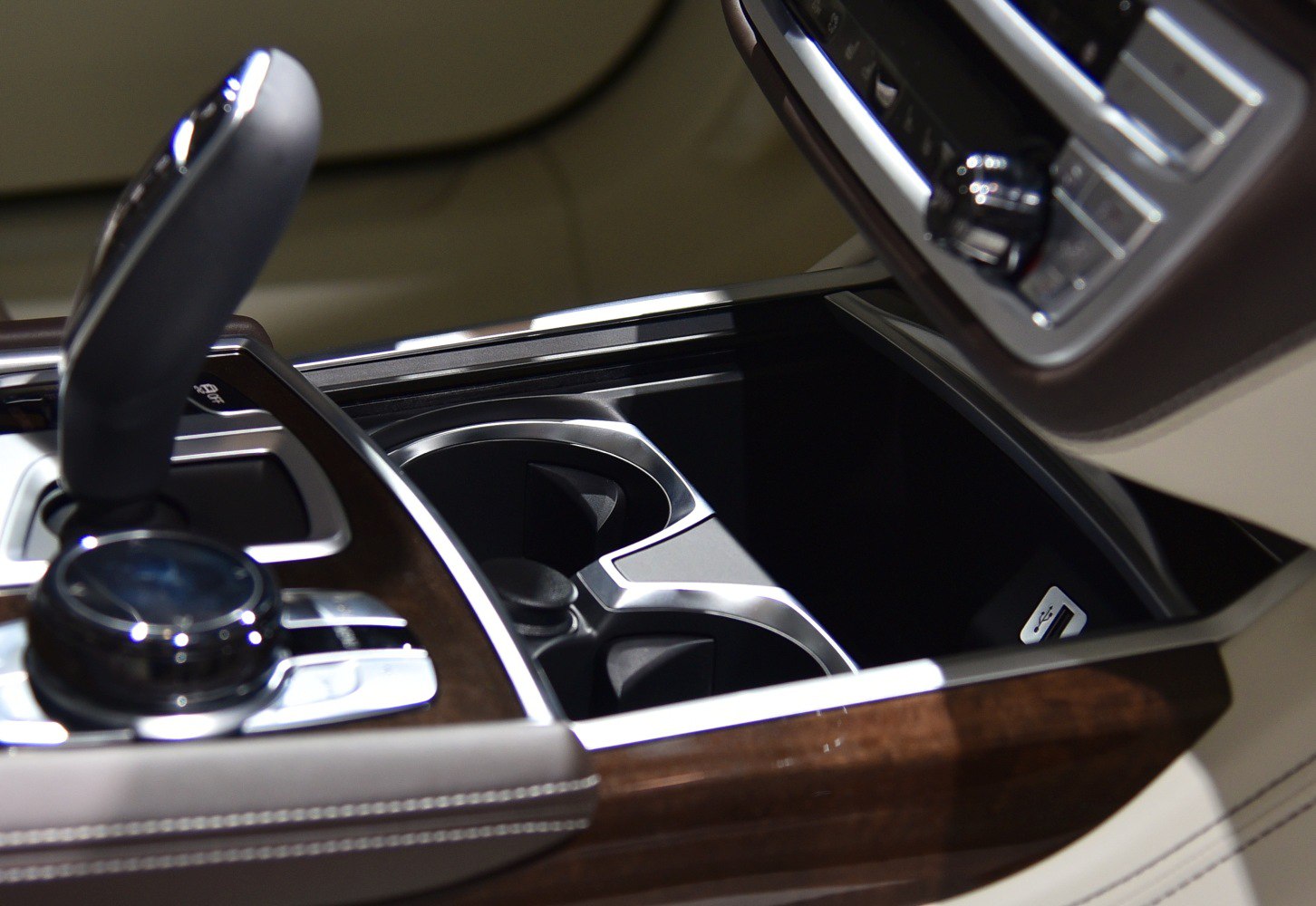 Center console with gear selector and dual cup holders