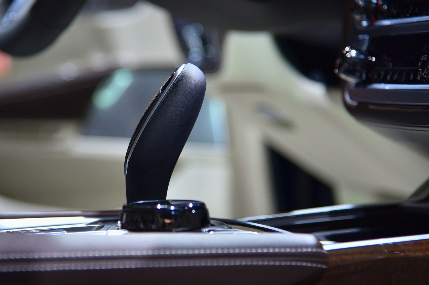 Close-up of modern luxury gear shifter and center console interior