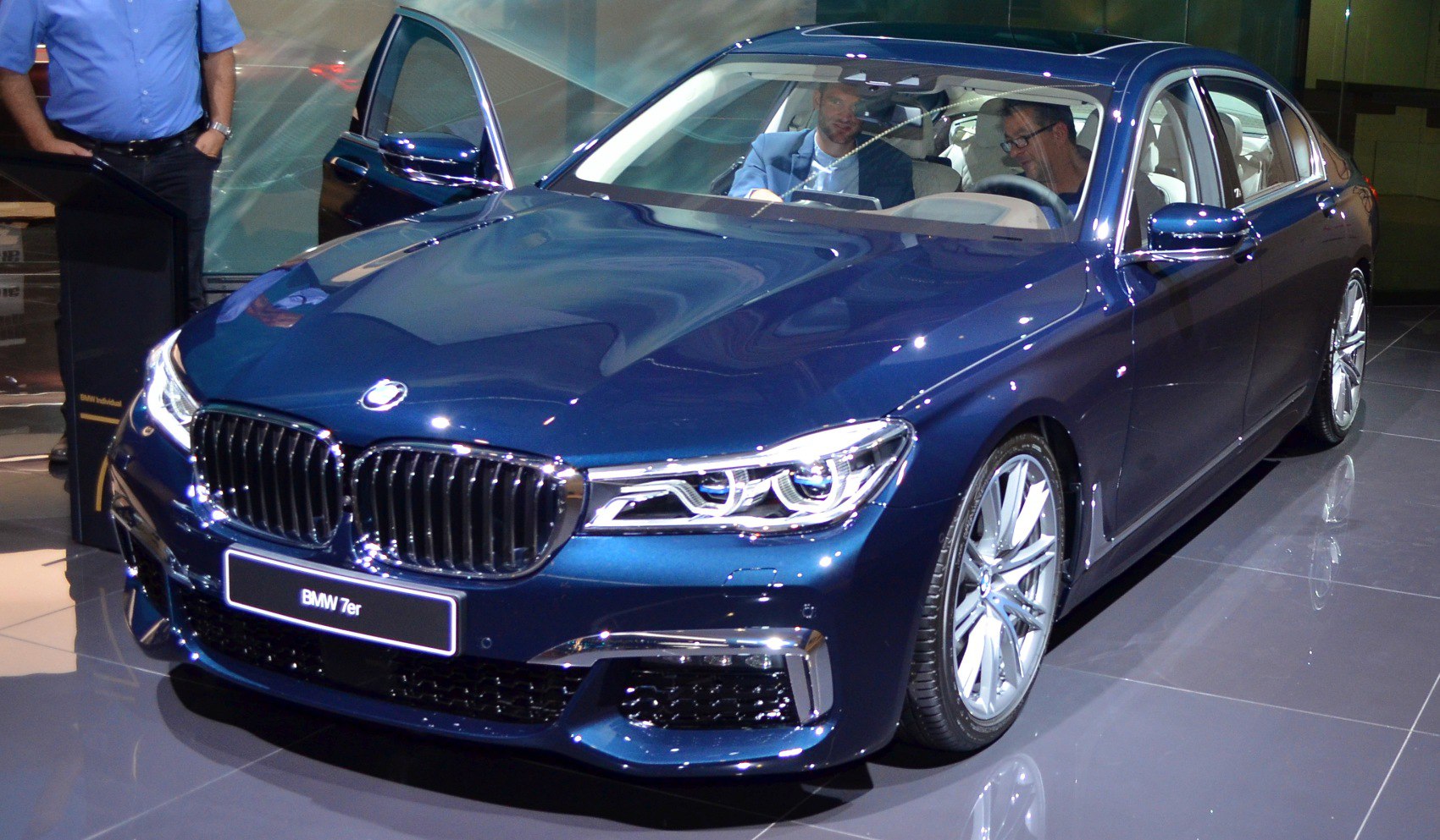 Front kidney grille and LED headlights of luxury sedan