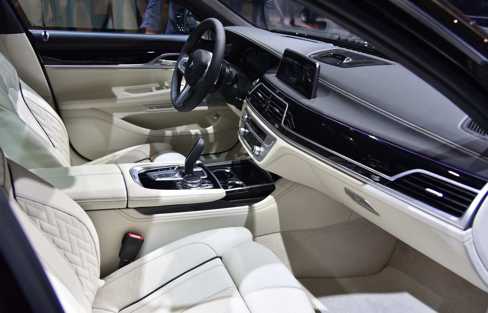 Luxury car interior with leather seats and modern dashboard
