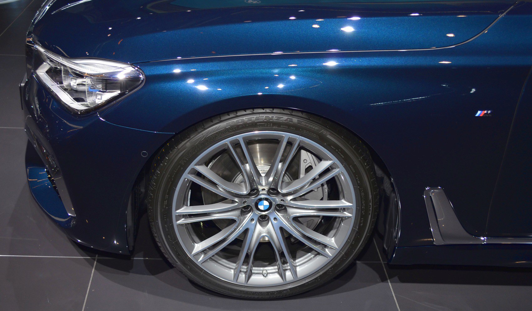 Front wheel with alloy rim and modern headlight