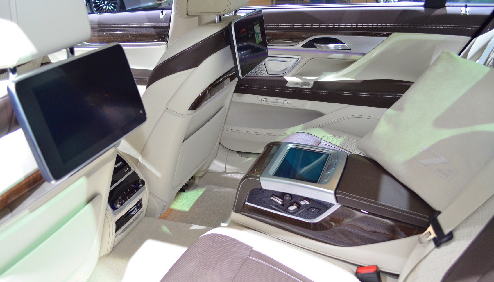 Luxury rear interior with dual rear screens and control panel