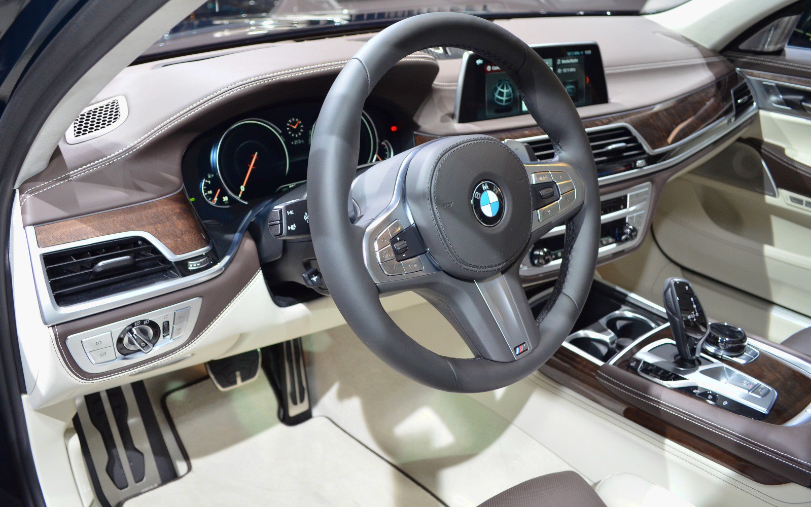 Luxury car interior with dashboard and steering wheel