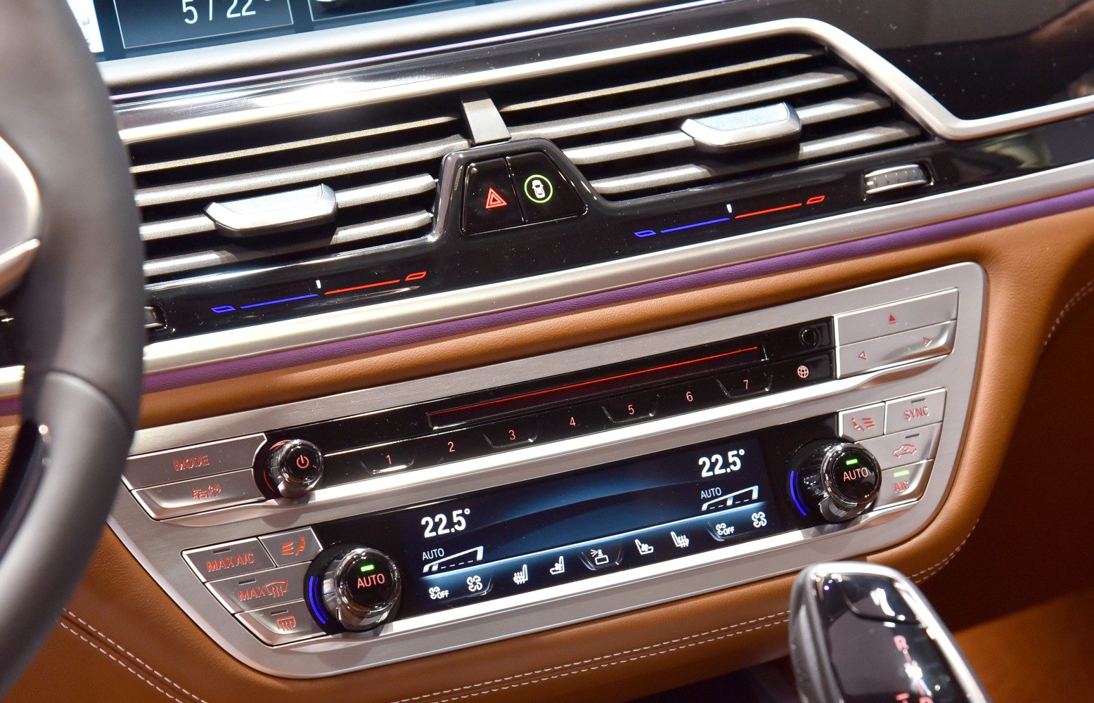 Dual-zone climate control interface with digital display and central air vents