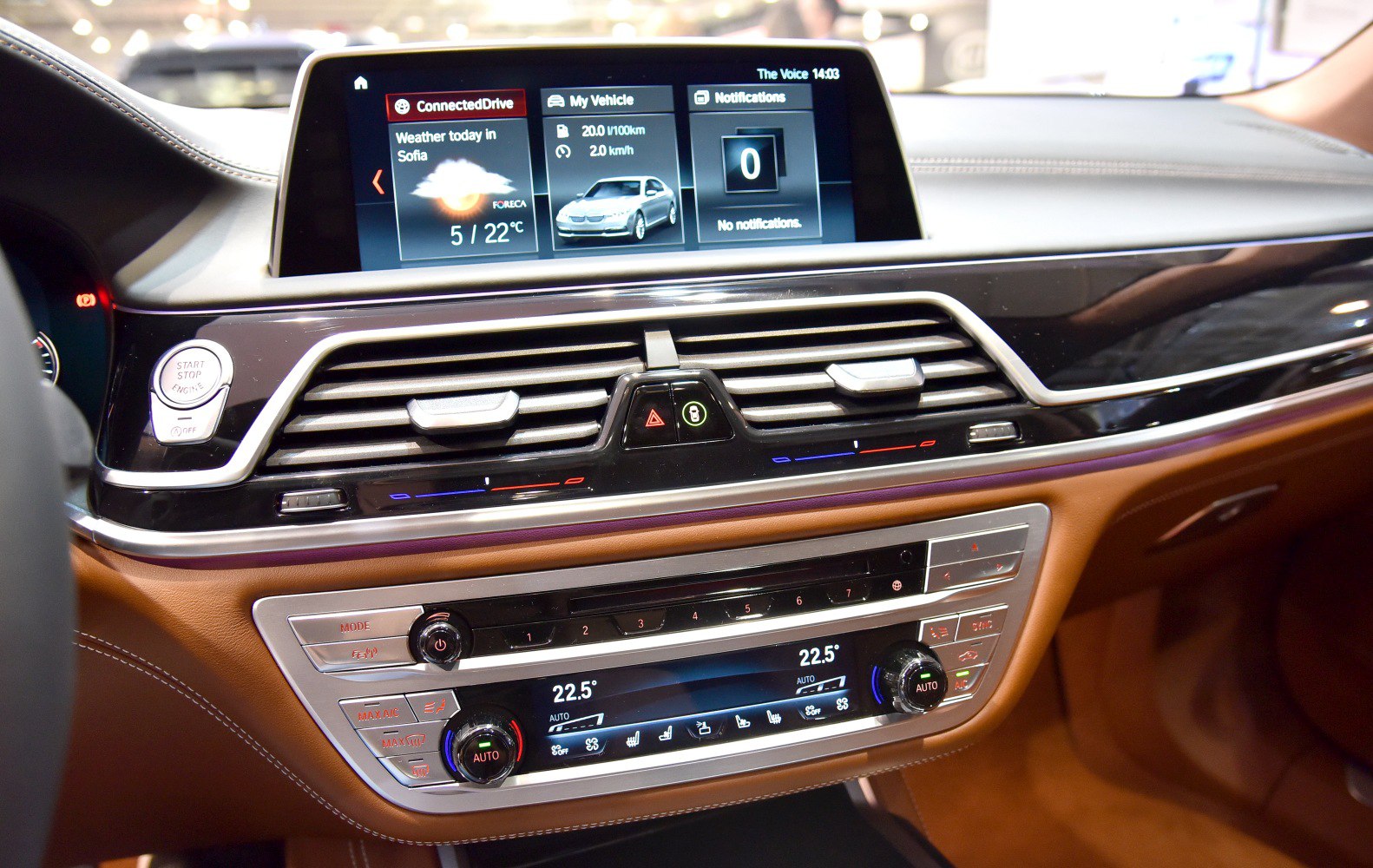 Luxury car dashboard with digital infotainment and climate control