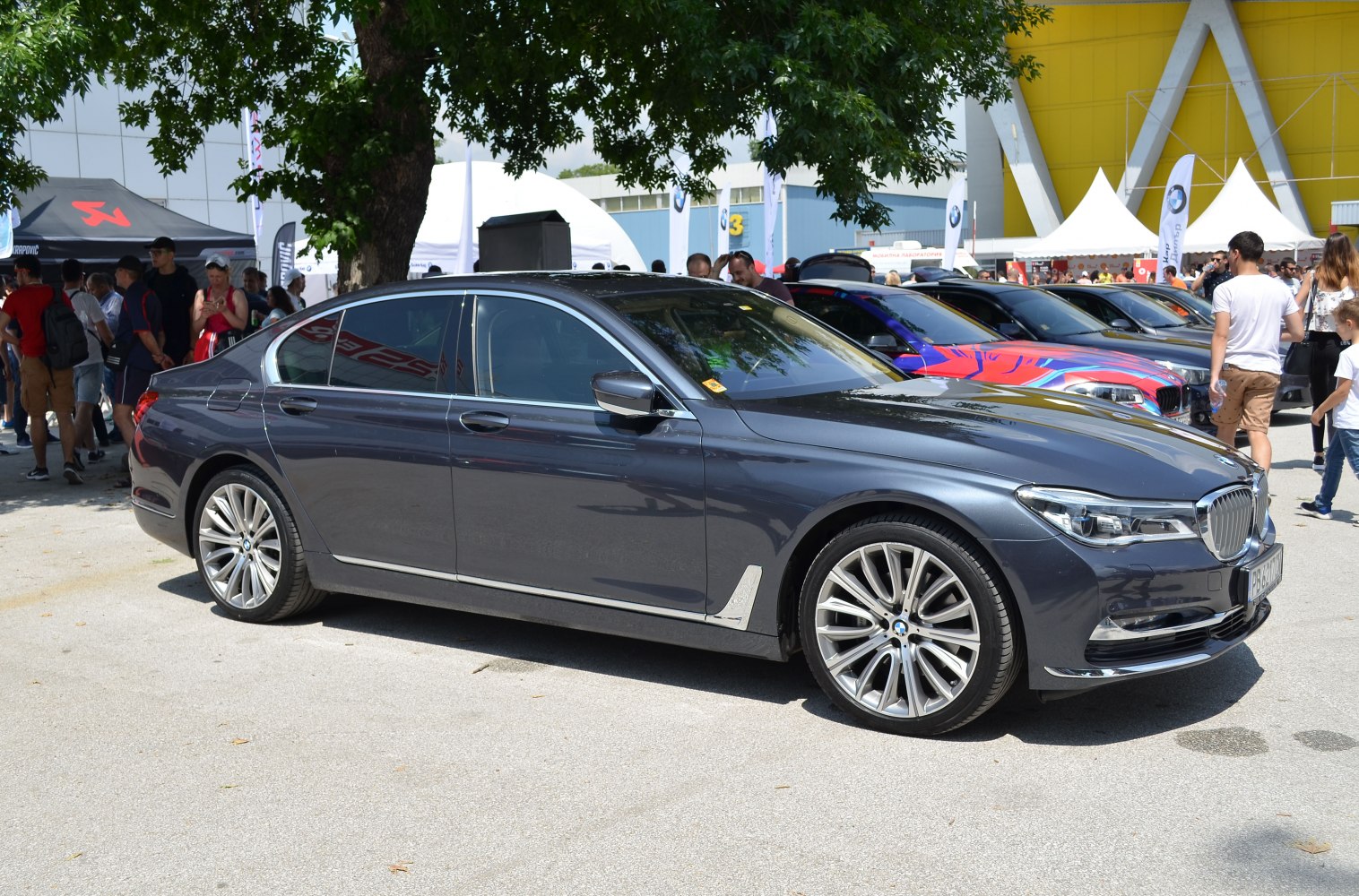Luxury sedan side profile with long wheelbase and alloy wheels