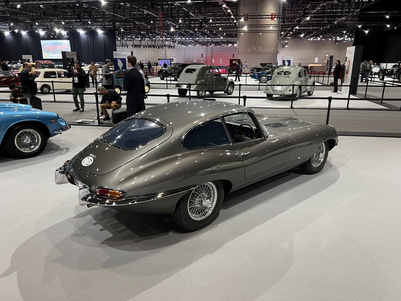 Sleek classic coupe rear with wire-spoke wheels