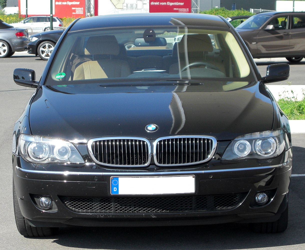 Front view with dual round headlights and kidney grille