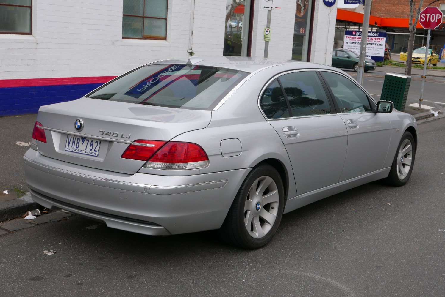Silver luxury sedan rear and side view, extended wheelbase, E66 facelift design