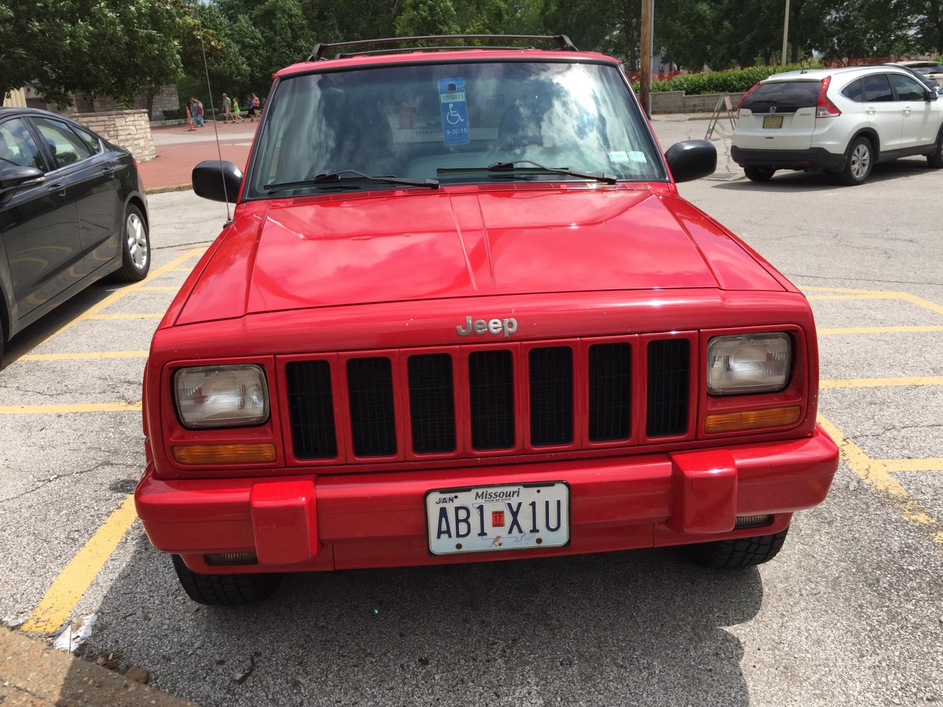 Front view with seven-slot grille and rectangular headlights