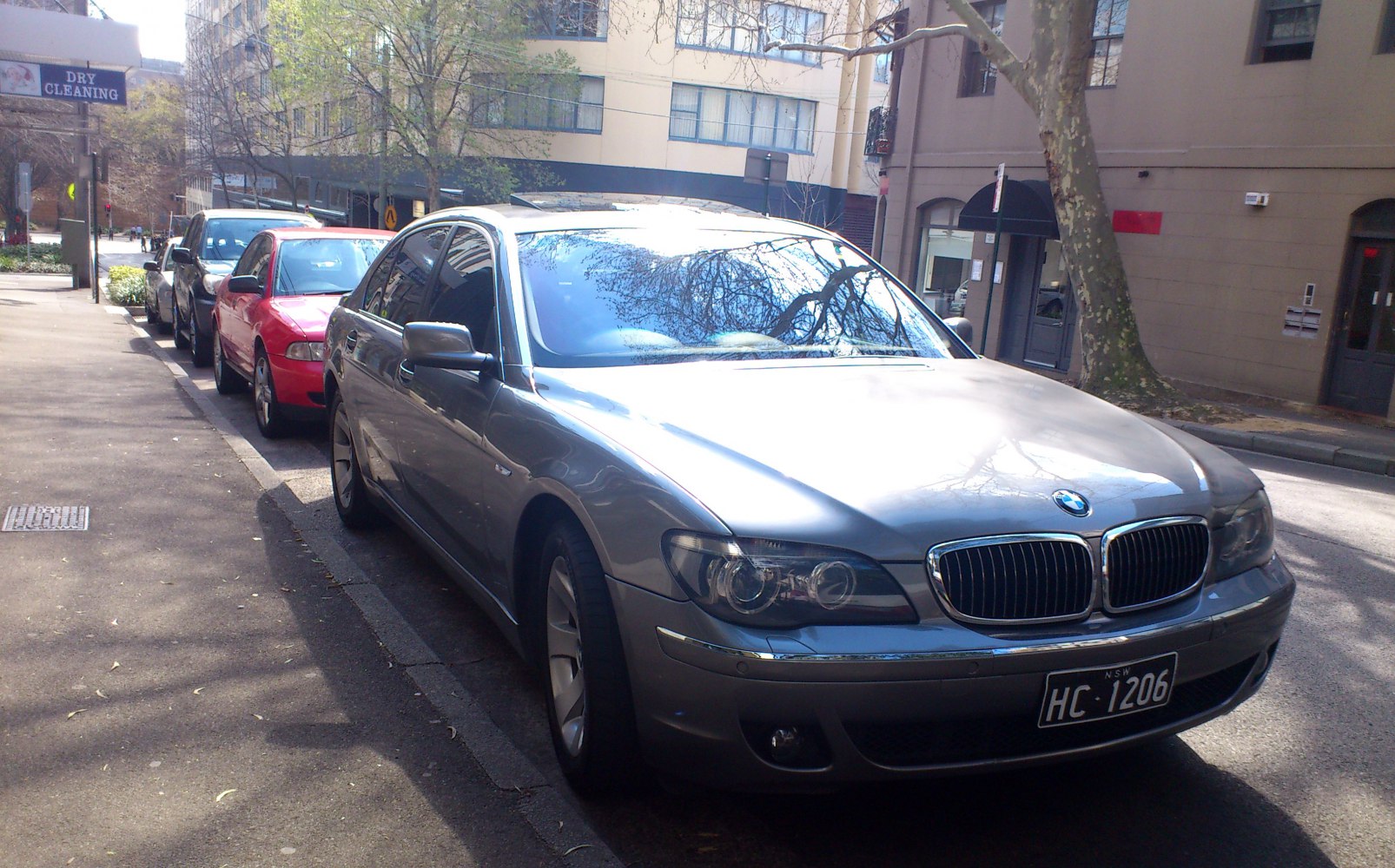 Front view of luxury sedan with kidney grille and dual headlights