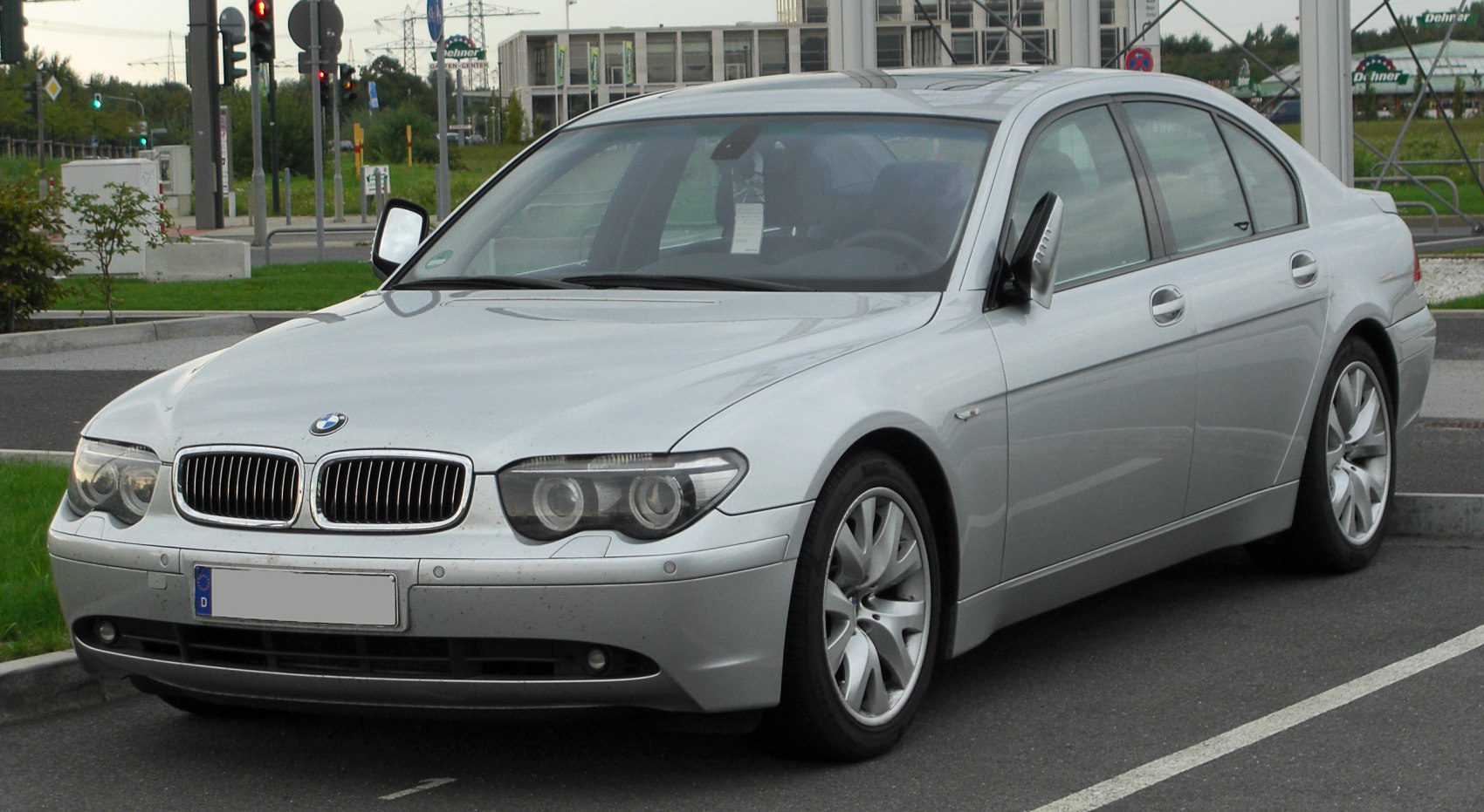 Silver sedan showing front and side with kidney grille and alloy wheels