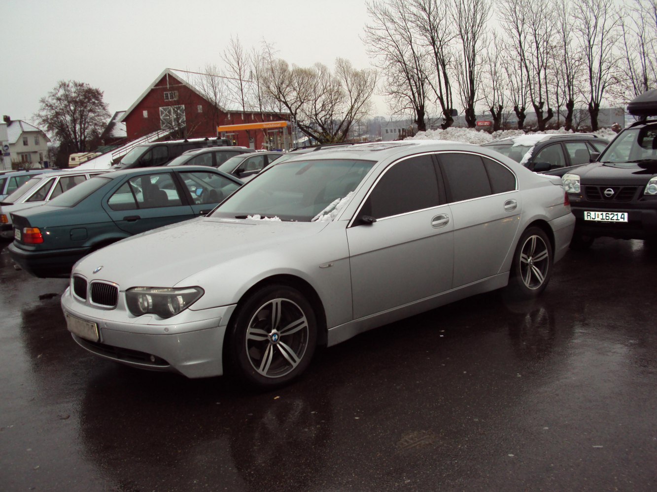 Silver sedan with tinted windows and alloy wheels