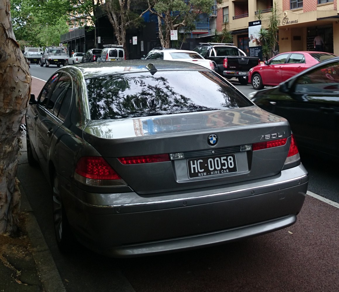 Rear view with distinct tail lights and trunk design