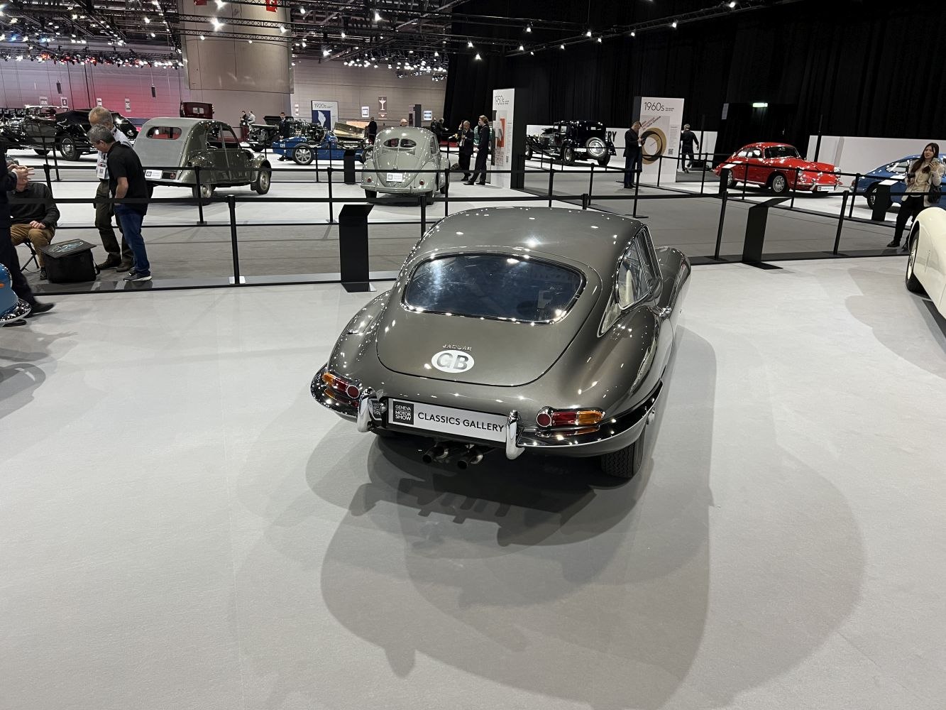 Rear view of classic sleek curved body with distinctive tail lights.
