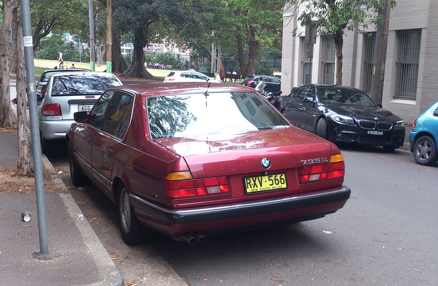 Rear view with dual exhaust and rectangular tail lights