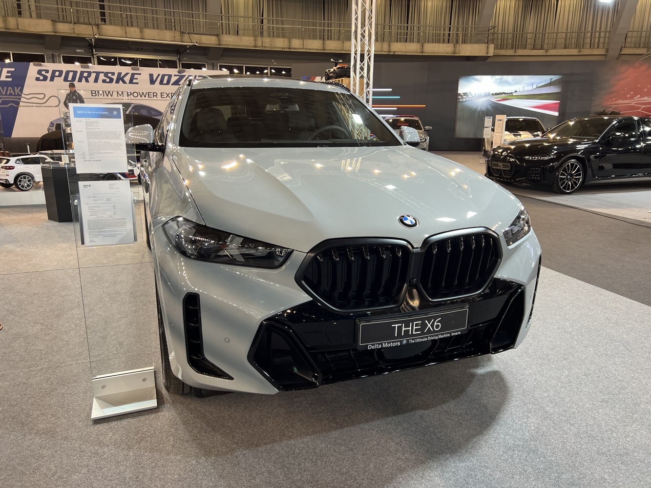 Bold aggressive grille and sleek headlight design at front view