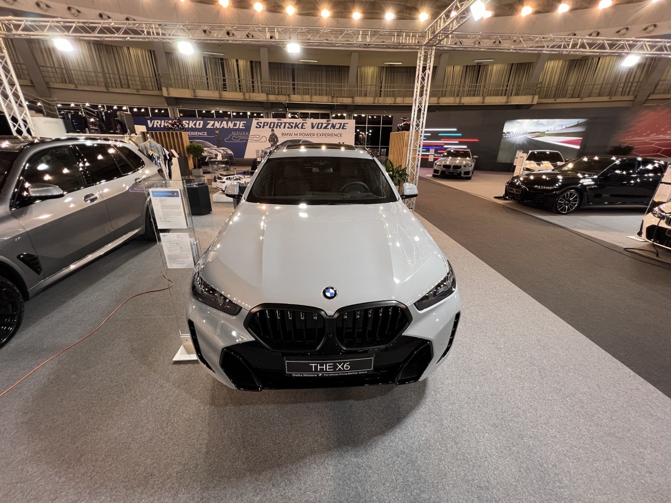 Front view with kidney grille and sleek headlights.