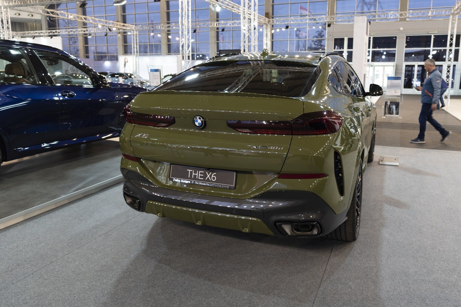 Sleek rear view with slim taillights and dual exhaust on sporty SUV