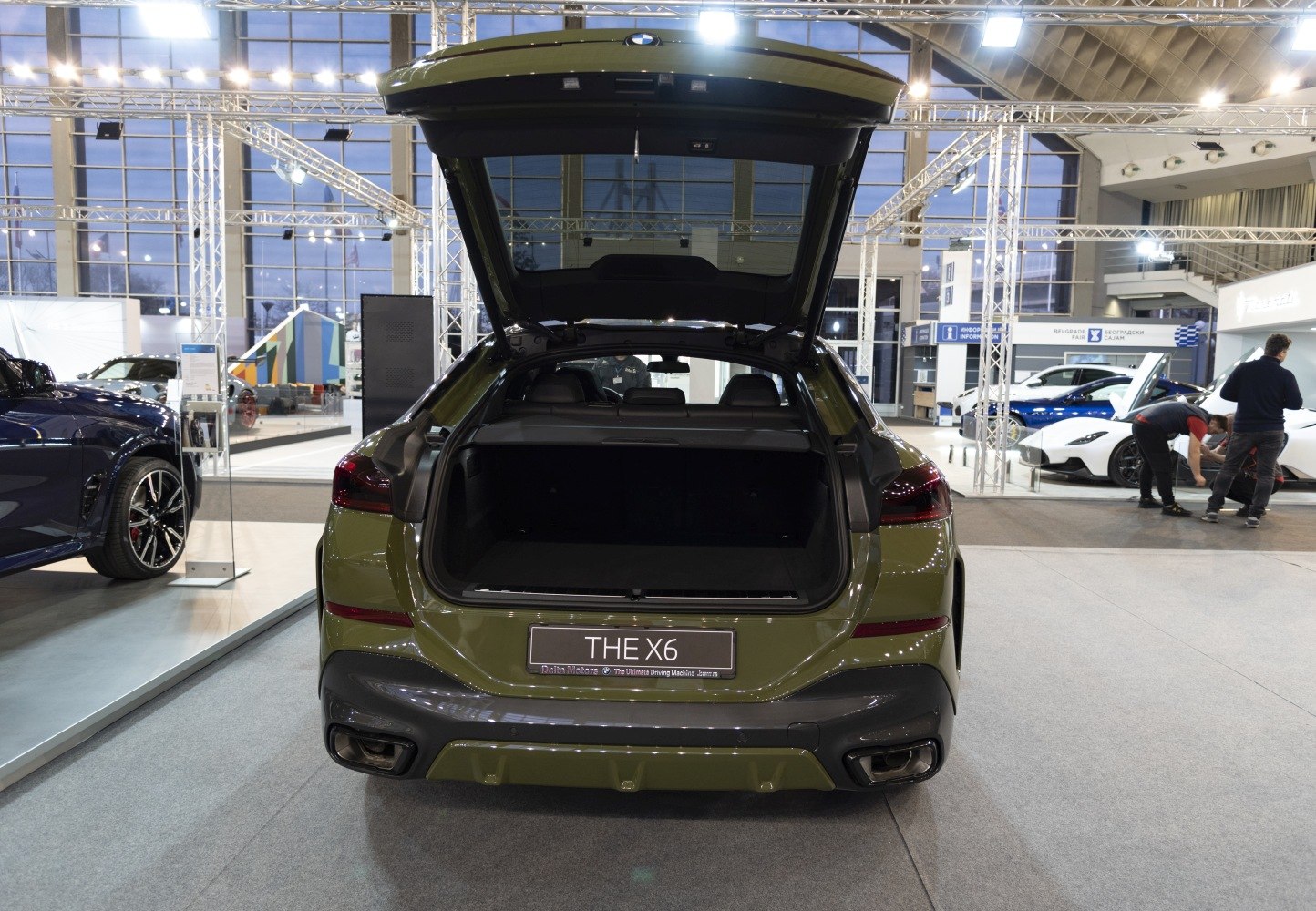 Rear view with open trunk of luxury SUV