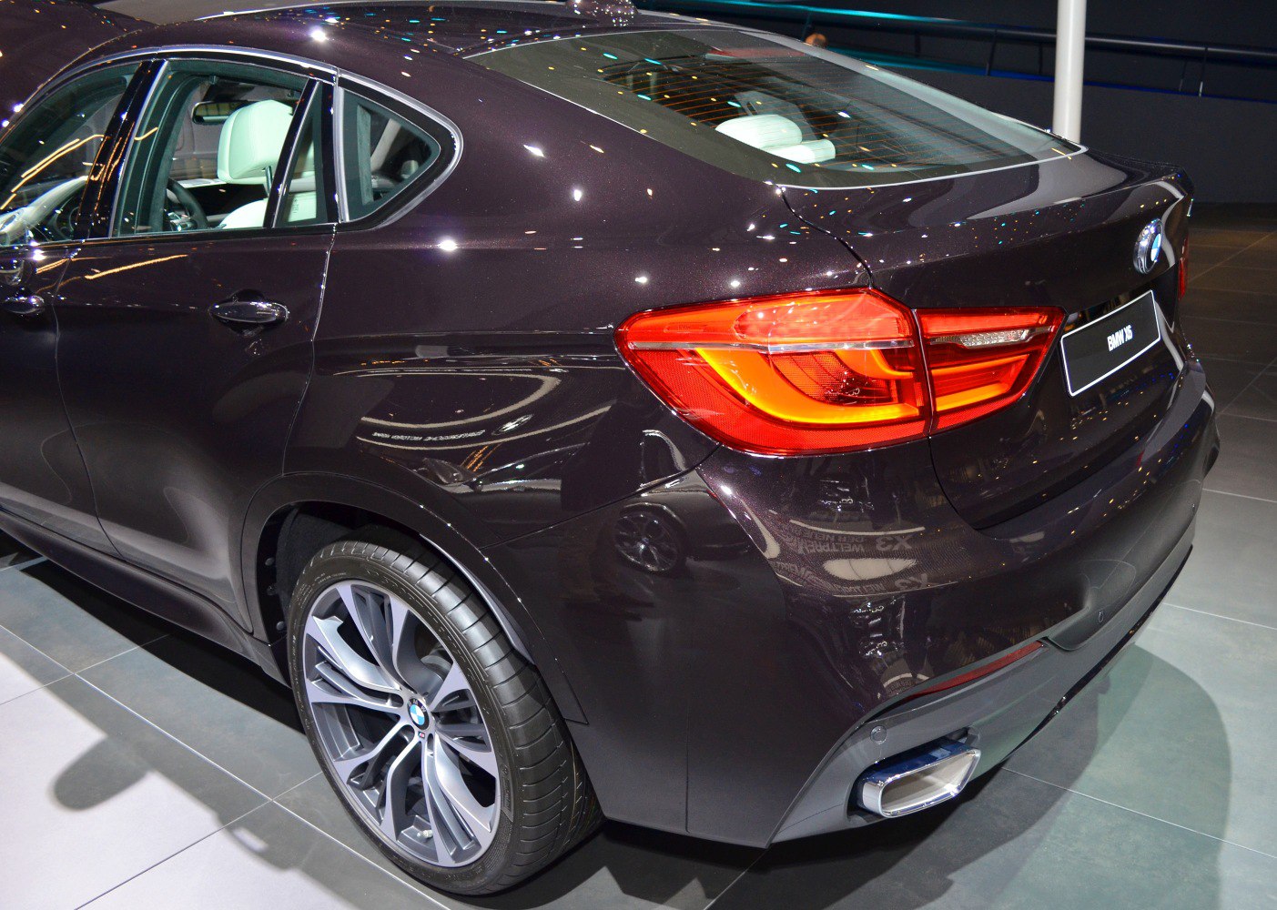 Rear section with tail light and alloy wheel
