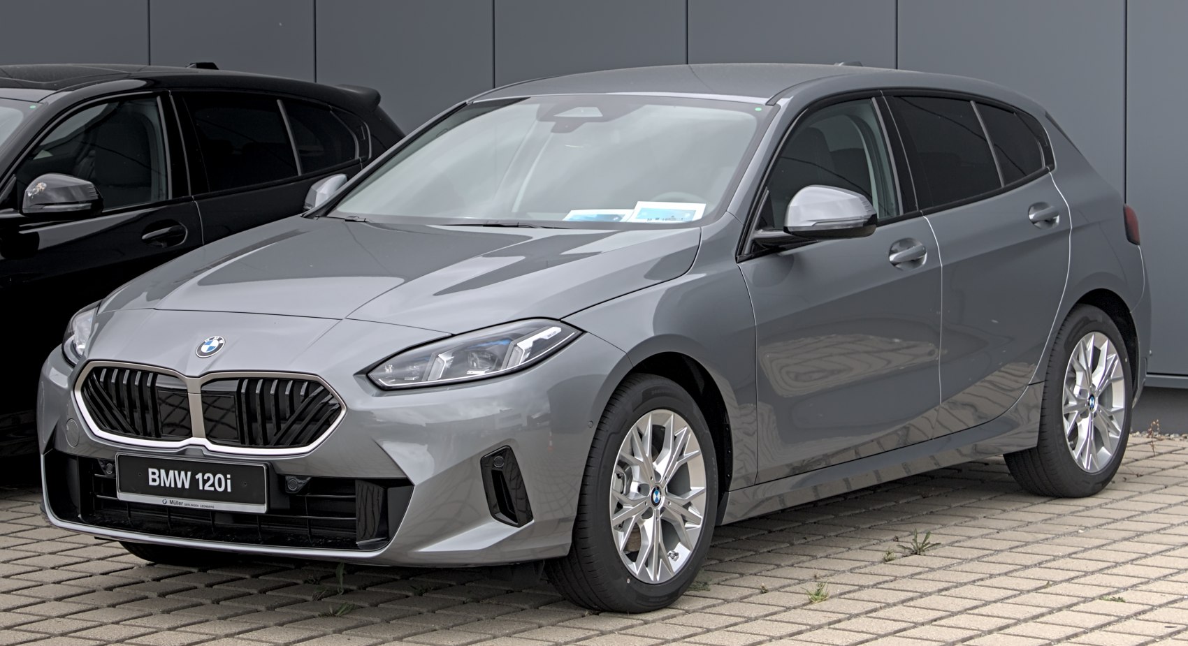 Modern hatchback with bold grille and sharp headlights