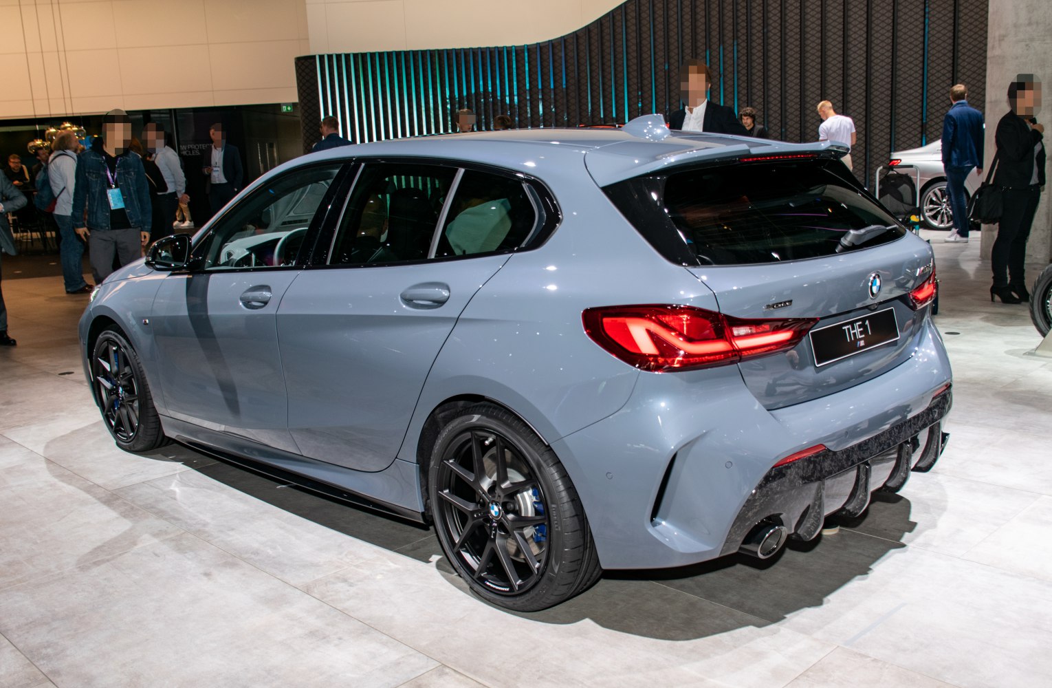 Rear side of hatchback with distinctive tail lights and sporty rear diffuser