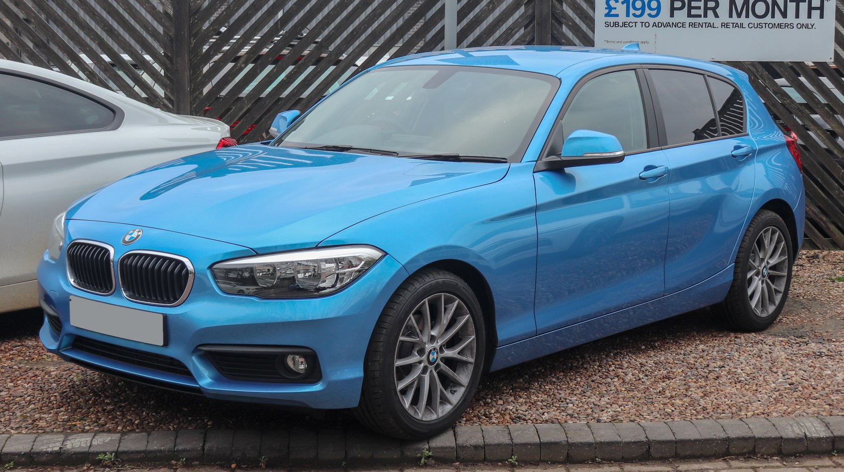 Blue hatchback front-side view with alloy wheels and facelift design