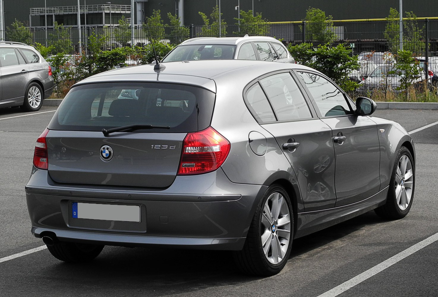 Rear and side view of a compact 5-door hatchback with distinctive taillights and alloy wheels