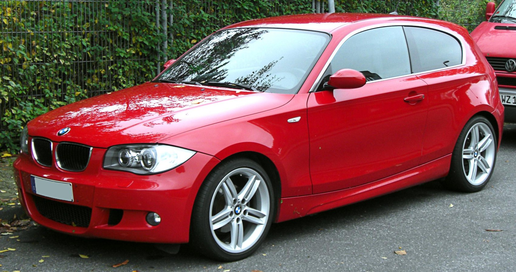 Front-side view of sporty 3-door hatchback with alloy wheels