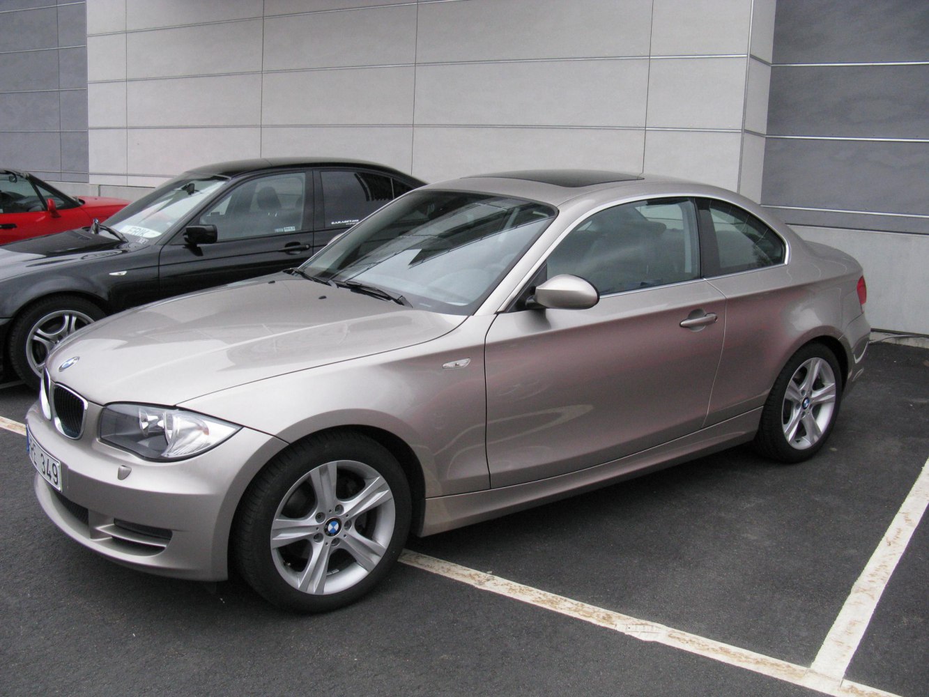 Silver compact coupe front and side view