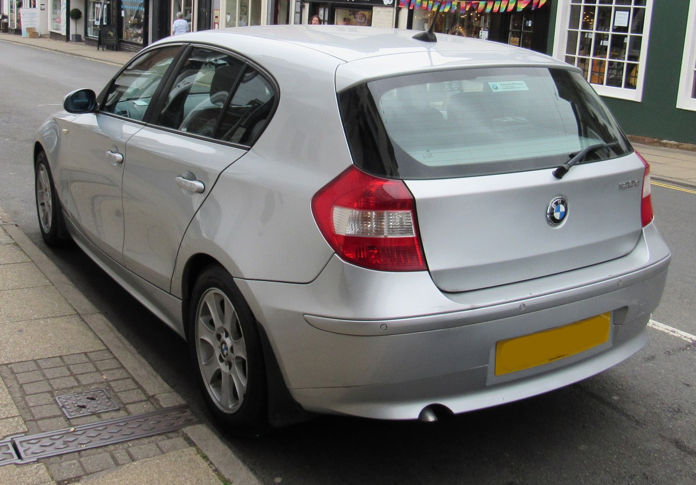 Silver hatchback rear with distinct taillights and side profile