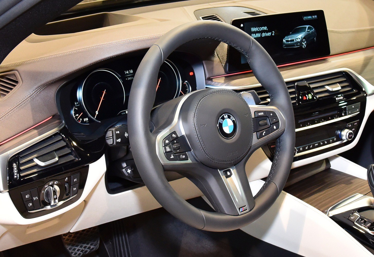 Luxury car interior with digital dashboard and multifunction steering wheel