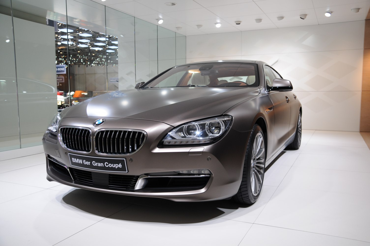 Front angled view with headlights and kidney grille