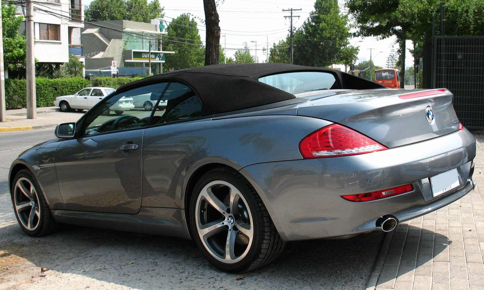 Rear soft top convertible with alloy wheels and sleek styling