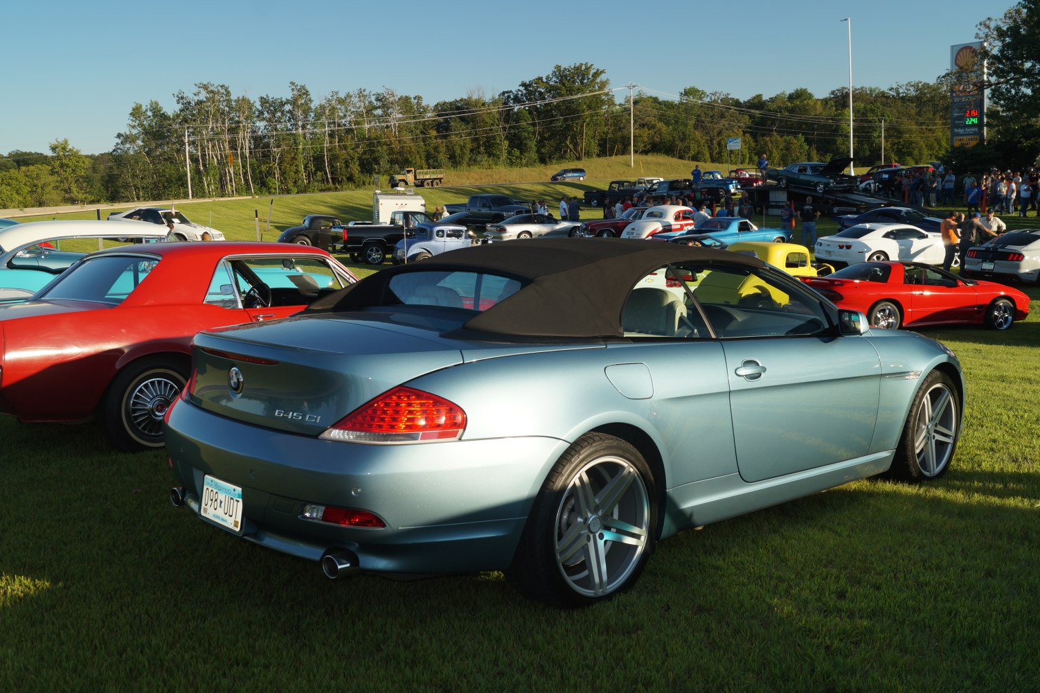 Convertible with soft top and alloy wheels in outdoor car show