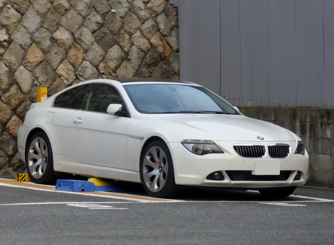 White coupe with kidney grille and sleek headlights